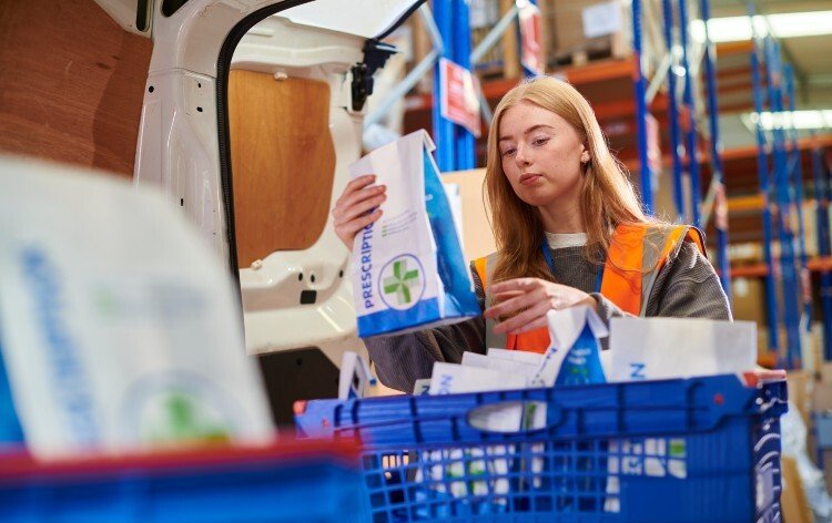 MTS-Courier, checking pharmacy load before leaving for the day,