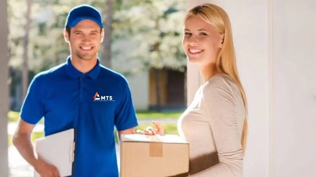 Another Happy MTS-courier customer receiving her next day delivery in Reading
